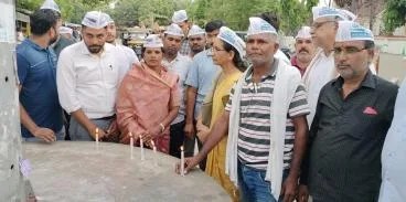 Rewa Today : Maihar rape case AAP registers protest by lighting candles